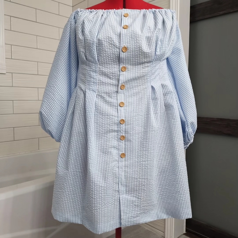 Knee length blue seersucker dress